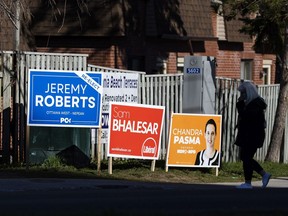 Signage for candidates running in the riding of Ottawa West-Nepean.
