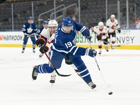 Maple Leafs forward Jason Spezza is pursued by Ottawa Senators winger Alex Formenton during a game this season. Spezza, who started his career in Ottawa and finished with 251 goals, 436 assists and 687 points in 686 games with the Senators, retired on Sunday.