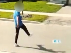 A volunteer for the Ontario Liberal candidate in Markham Unionville was caught on video destroying a PC Party opponent's lawn sign.
