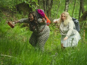 Deandra, left, and Rae of Snowflake Mountain as they walk through the wilderness.