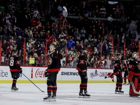 Ottawa Senators captain Brady Tkachuk and teammates salute the announced crowd of 17,102 after their last home game of the season at Canadian Tire Centre on April 28, 2022.