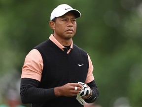 Tiger Woods stands on on the 16th hole during the third round of the PGA Championship at Southern Hills Country Club on Saturday. Woods shot a nine-over-par 79, the worst score of his career at this major championship.
