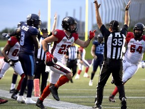 Redblacks wide receiver Jaelon Acklin celebrates a touchdown catch on a pass by Jeremiah Masoli against the Argonauts in Friday's pre-season contest.