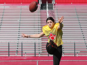 Women's tackle football at Carleton University in Ottawa, Friday. BC kicker Kristie Elliott warms up Friday morning. Kristie is the first Canadian female to play and score in university football for Simon Fraser University.