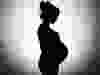 Silhouette of a pregnant woman.