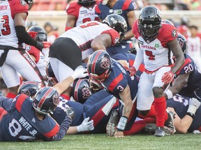 File photo/ Montreal Alouettes quarterback Vernon Adams Jr. (3) goes in for a touchdown during first half CFL pre-season football action against the Ottawa Redblacks in Montreal, Friday, June, 3, 2022.