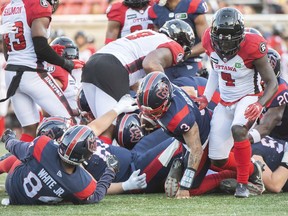 Montreal Alouettes quarterback Vernon Adams Jr. (3) goes in for a touchdown during first half CFL pre-season football action against the Ottawa Redblacks in Montreal, Friday, June, 3, 2022.