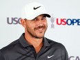 Brooks Koepka addresses the media during a press conference for the U.S. Open golf tournament at The Country Club.