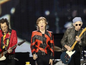 The Rolling Stones announced the show cancellation in a statement, saying the 78-year-old Mick Jagger tested positive "after experiencing symptoms of COVID upon arrival at the stadium" on the outskirts of Amsterdam.