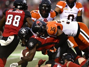 B.C. Lions defensive back Quincy Mauger (36) tackles Ottawa Redblacks wide receiver Terry Williams (81) during first half CFL football action in Ottawa on Thursday, June 30, 2022.