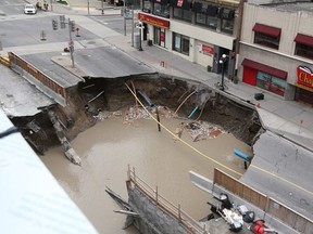 A sinkhole in June 2016 swallowed a chunk of Rideau Street and a minivan as LRT workers excavated soft ground in the area to build the Confederation Line.