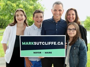 Along with his wife, Ginny, and three kids (Erica, left, Jack and Kate), Mark Sutcliffe announced his candidacy for mayor on Wednesday, June 29, 2022 at a park in Kanata.