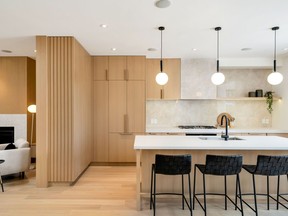 This project by MGB Construction Group Ltd. won the 2022 BILD Renovation Award for Best Kitchen Renovation over $100,000. ROBERT HOLOWKA | BIRD HOUSE MEDIA