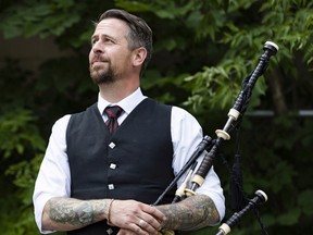 Nico Gravel, a busker who plays the bagpipes outside Bluesfest, has been fined twice for encumbering a street.