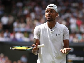 Nick Kyrgios of Australia reacts against Novak Djokovic of Serbia during their Men's Singles Final match on day fourteen of The Championships Wimbledon 2022 at All England Lawn Tennis and Croquet Club on July 10, 2022 in London, England. (Photo by Julian Finney/Getty Images)