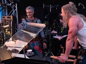 Director Taika Waititi as Korg and Chris Hemsworth as Thor on the set of Marvel Studios' Thor: Love and Thunder.