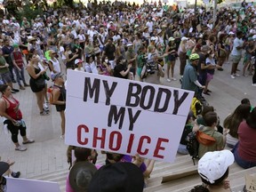 Demonstrators gather at the federal courthouse in Austin, Texas. following the Supreme Court's decision to overturn Roe v. Wade, on June 24, 2022.