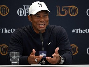 US golfer Tiger Woods attends a press conference held ahead of The 150th British Open Golf Championship on The Old Course at St Andrews in Scotland on July 12, 2022.
