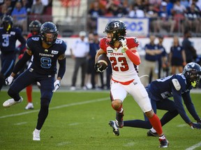 Ottawa Redblacks wide receiver Jaelon Acklin (23) runs the ball forward first quarter CFL action against the Toronto Argonauts, in Toronto on Sunday July, 31, 2022.