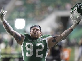 Roughriders defensive lineman Garrett Marino struts to the locker room after being ejected from the game against the Redblacks on Friday night.