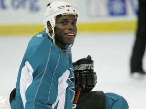San Jose Sharks forward Mike Grier takes a breather during practice on Thursday at Rexall Place.