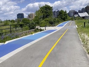 A still image from a National Capital Commission video shows the new segregated pedestrian and cycling lanes on the multi-use pathway to Pimisi Station.