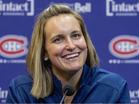 Team Canada star Marie-Philip Poulin answers reporters' questions after being introduced as a player development consultant for the Montreal Canadiens at practice at the Bell Sports Complex in Brossard on Tuesday, June 7, 2022.