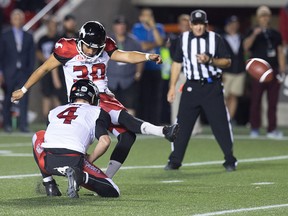 Rene Paredes kicks a field goal in the overtime period as the Ottawa Redblacks take on the Calgary Stampeders in CFL action at TD Place Stadium at Lansdowne Park in Ottawa, July 8, 2016.