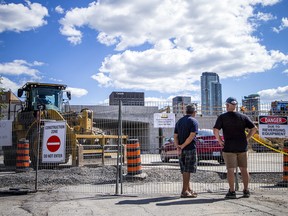 A section of Highway 417 was close this weekend as the Booth Street bridge was removed and replaced with a new version. There was a viewing area on Booth Street where Roy Delaney and Wayne MacWhirter were checking it out, Saturday, Aug. 13, 2022.
