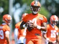 Deshaun Watson of the Cleveland Browns runs a drill during Cleveland Browns training camp at CrossCountry Mortgage Campus on July 30, 2022 in Berea, Ohio.