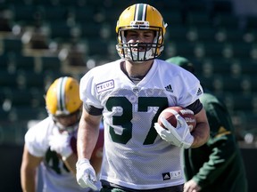 Christophe Normand takes part in the opening day of the Edmonton Eskimos' training camp at Commonwealth Stadium, in Edmonton Sunday May 20, 2018.