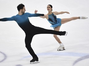 Deanna Stellato-Dudek and Maxime Deschamps of Canada compete in the pairs' short program during the ISU Four Continents Figure Skating Championships in Tallinn, Estonia, Thursday, Jan. 20, 2022.