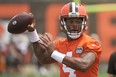 Cleveland Browns quarterback Deshaun Watson throws a pass during training camp. The NFL is hoping the hiring of a new lawyer will help extract the proper amount of punishment for Watson.