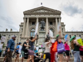Abortion rights protesters march outside the Indiana State Capitol building on July 25, 2022 in Indianapolis.