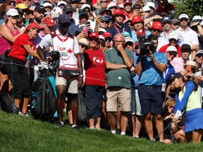 Fans watch Paula Reto during her final round at the CP Women's Open on Sunday. The event wrapped up at the Ottawa Hunt and Golf Club with a record-high attendance of more than 75,000.