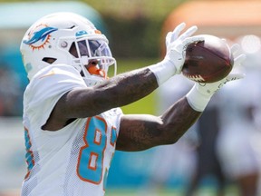 Wide receiver DeVonte Dedmon  catches a pass during Miami Dolphins training camp on Aug. 5, 2022. Dedmon has returned to the Ottawa Redblacks of the CFL.
