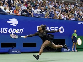 Serena Williams returns a shot to Anett Kontaveit during the second round of the U.S. Open tennis championships in New York City, Wednesday, Aug. 31, 2022.