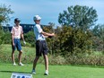 Aubrey Shiposh hit the first hole in one of his life at the Sun Scramble Sunday at the Marshes. His parents, Kathy and Dave, were on hand to watch the shot go in.