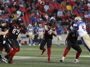 Ottawa Redblacks quarterback Jeremiah Masoli (#8) throws the ball during first half action against the Winnipeg Blue Bombers at TD Place Stadium in Ottawa on Friday June 17, 2022.