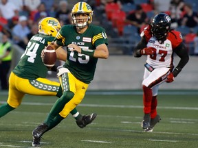 Edmonton Elks quarterback Taylor Cornelius (15) runs with the ball during first half CFL action against the Ottawa Redblacks in Ottawa on Friday, August 19, 2022.The Elks feel confident they can break their 12-game losing streak at Commonwealth Stadium when the Ottawa Redblacks visit on Saturday.