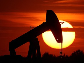 An oil pump of IPC Petroleum France is seen at sunset outside Soudron, near Reims, France, Aug. 24, 2022.
