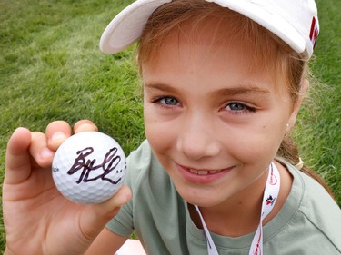 Ava Mitchell, 8, a huge Brooke Henderson fan, got an autograph during a practice round at the CP Women's Open at the Ottawa Hunt and Golf Club on Tuesday.