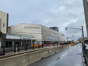 Traffic lights were out of service near the CF Rideau Centre mall and the Shaw Centre the evening of Monday, Aug. 22, 2022. Hydro Ottawa reported an outage affecting the city's downtown core.