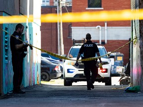 Ottawa police investigate the stabbing of a woman that happened near Bank Street and McLaren Street on Friday, Sep. 2, 2022.