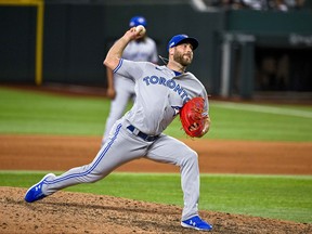 Sep 11, 2022; Arlington, Texas, USA; Toronto Blue Jays relief pitcher Anthony Bass (52) pitches against the Texas Rangers during the eighth inning at Globe Life Field.