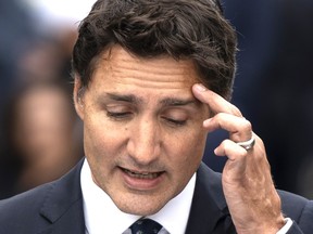 Prime Minister Justin Trudeau gestures while making a speech during the Liberal summer caucus retreat in St. Andrews, N.B. on Monday, Sept. 12, 2022.