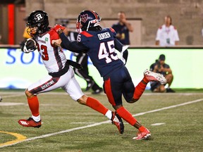 Ottawa Redblacks wide receiver Jaelon Acklin (23) escapes coverage by Montreal Alouettes defensive back Kenneth Durden (45) with the ball during the second quarter at Percival Molson Memorial Stadium.