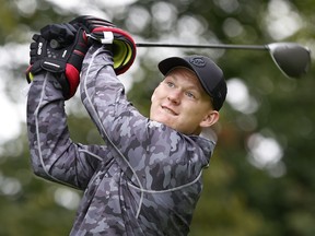 Perhaps showing how excited he is for the opening of training camp on Thursday, Senators captain Brady Tkachuk wears hockey gloves as he hits a drive yesterday during the team’s charity golf tournament at Loch March.