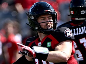 Redblacks quarterback Nick Arbuckle was tackled two yards short of the first-down marker on a key third-down play late in the final quarter of Saturday's game against the Argos.