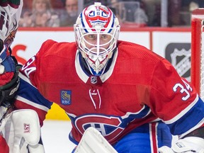 Montreal Canadiens goalie Jake Allen tracks the puck during second period against the Arizona Coyotes in Montreal on Oct. 20, 2022.